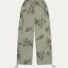 The Couture Club Draped Camo Oversized Cargos