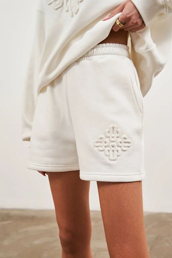 The Couture Club Emblem Embossed Shorts