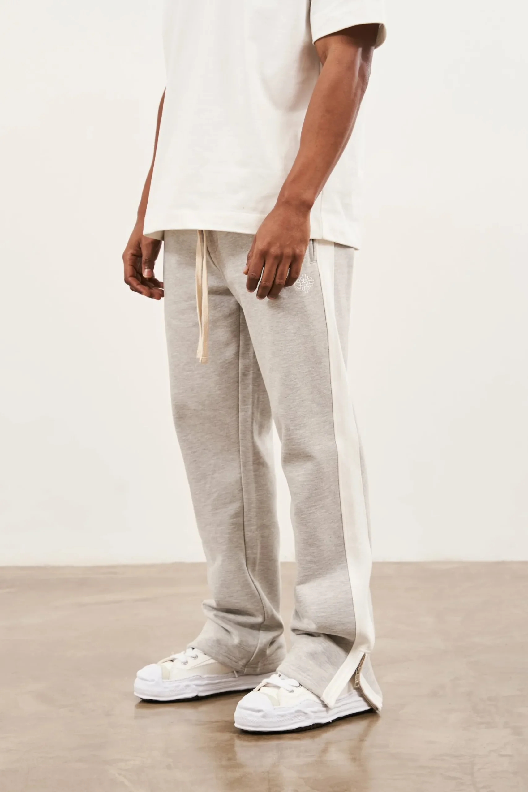 emblem_side_panel_split_h_0.webp The Couture Club Emblem Side Panel Split Hem Joggers