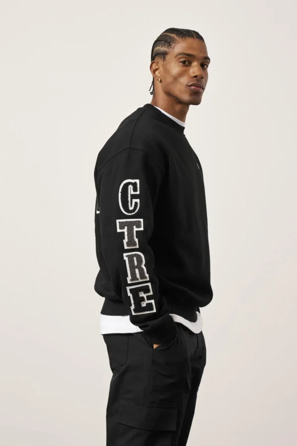 The Couture Club Multibadge Chenille Sweatshirt